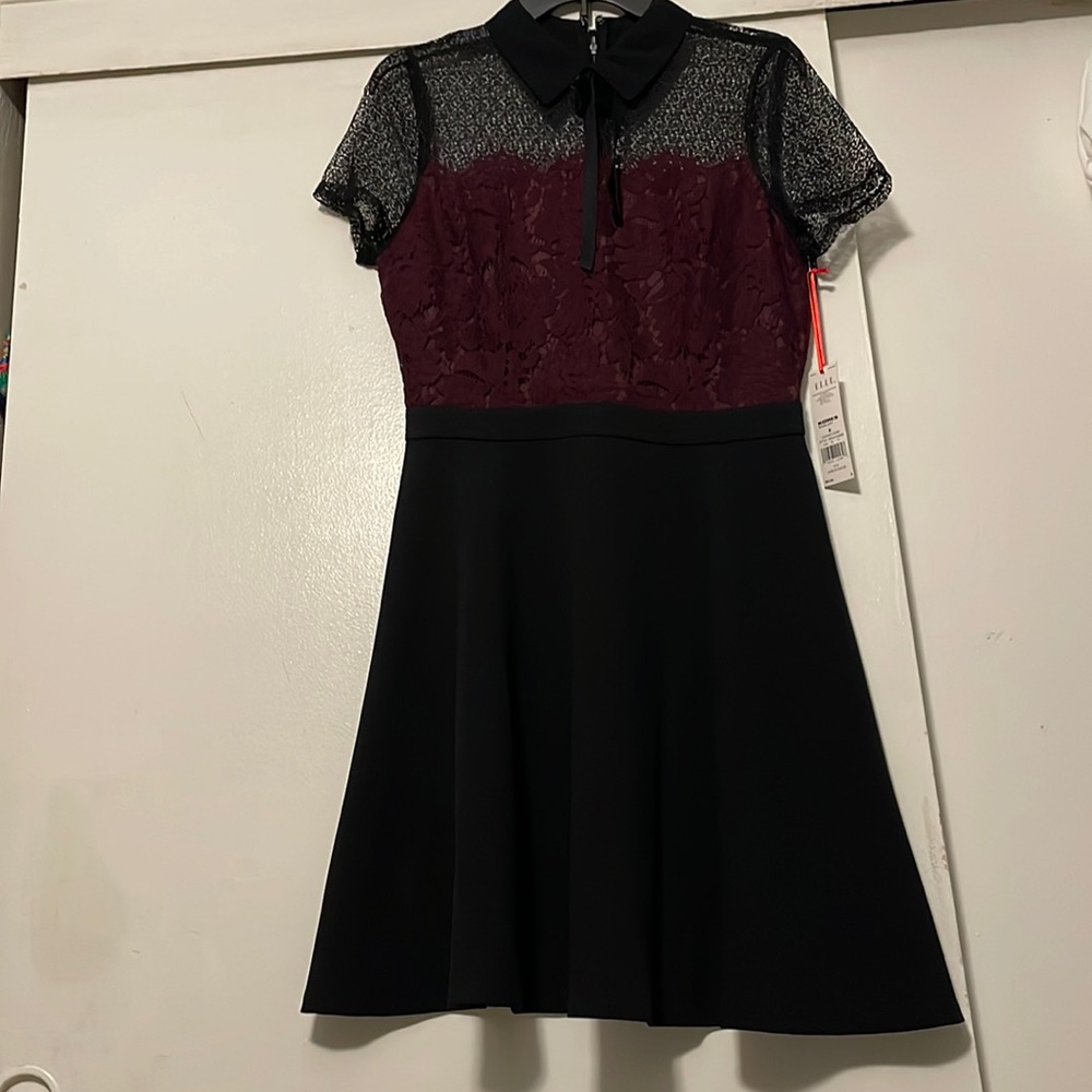 Bow and collared dress.